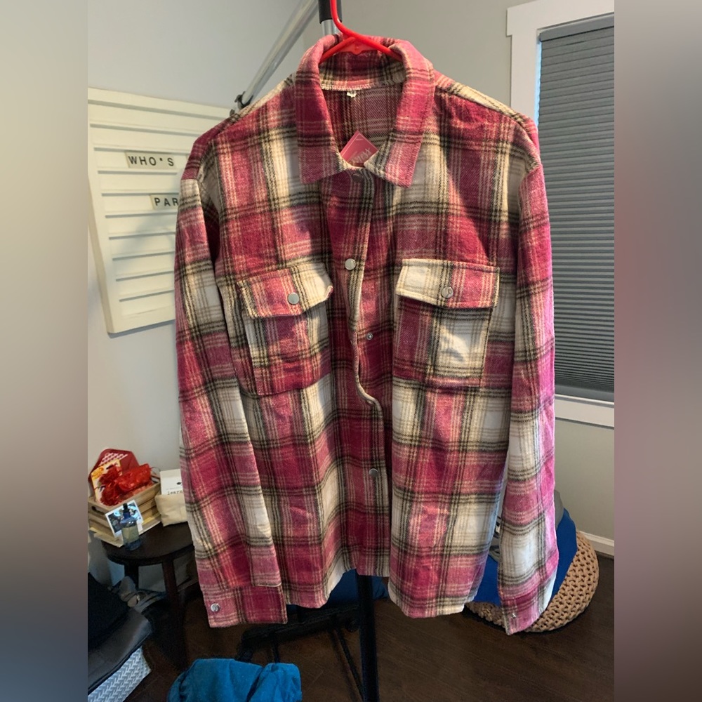 New flannel top. Soft flannel, brand new with tags.